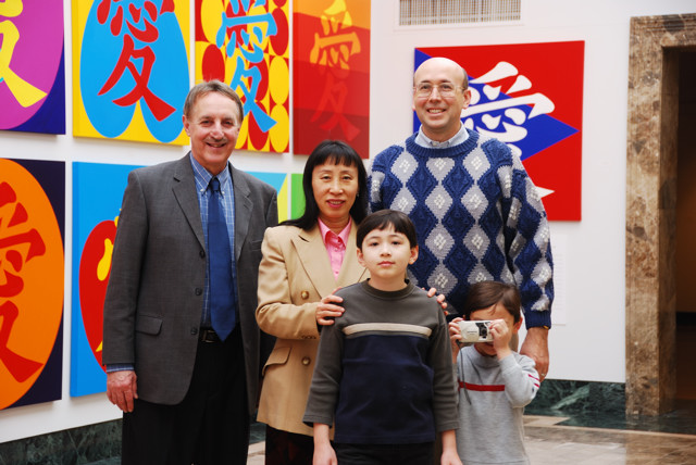 Dr. Louis Zona with
      Wenlan Hu Frost and her husband Daniel Allen Frost and sons Daniel
      and David (holding camera)